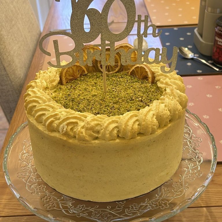 Lemon & Pistachio Birthday cake topped with Happy 60th Birthday Lemon & Pistachio Birthday cake topped with Happy 60th Birthday