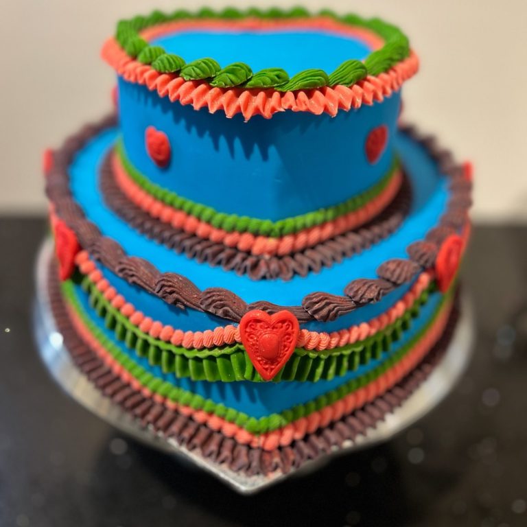 Happy wedding couple cutting wedding cake Happy wedding couple cutting wedding cake