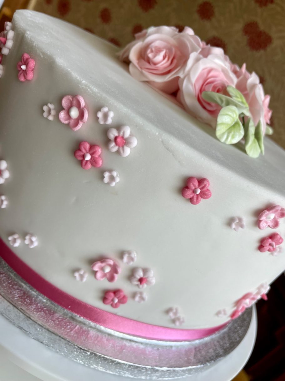 Summer wedding posies hand made sugar daisies, roses and peonies on wedding cake Summer wedding posies hand made sugar daisies, roses and peonies on wedding cake